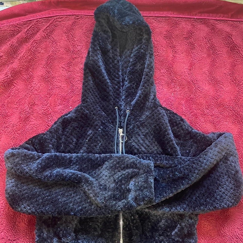 Selling a fuzzy hot and delicious jumpsuit all black